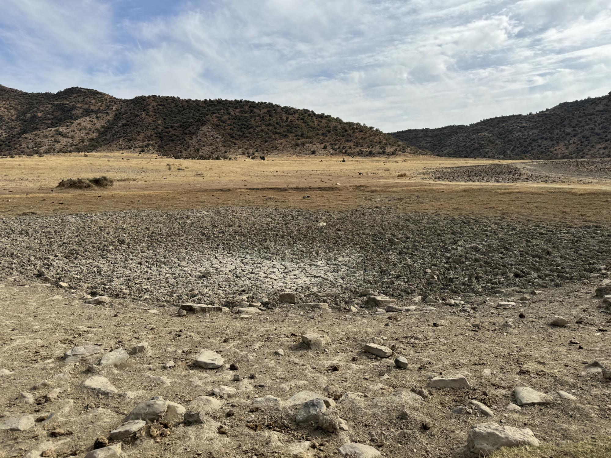 Photo of photo story from Waqar Ul Hassan Tareen showing a dried pond.